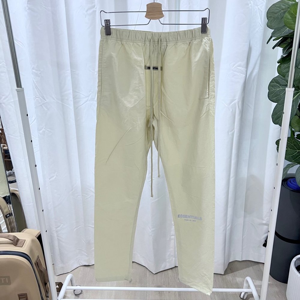 Fear of God Essentials Nylon Pants With Reflective Logo - Cream